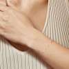 glow-204-0110-19-gouden-schakelarmband-met-golvend-patroon-4-mm-breed-lengte-19-cm