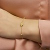 gold-plated-armband-met-schelp