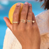 jackie-gold-jkr25-512-gedraaide-14-karaat-gouden-ring-met-ronde-blauwe-topaas