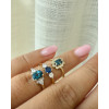 14-karaat-gouden-ring-met-ovale-london-blue-topaas-0-9-crt-en-diamant-0-24-crt-6-6-mm-breed