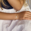 14-karaat-gouden-vlinder-armband-met-witte-parelmoer-9-13-cm
