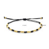 armband-met-zwart-nylon-en-gouden-bolletjes-lengte-12-24-cm