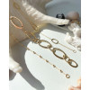 gouden-schakelarmband-met-opengewerkte-ovalen-lengte-19-cm