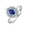 ovale-witgouden-ring-met-diamanten-0-15-crt-london-blue-topaas-en-ioliet-13-mm-breed