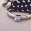 solitairring-witgoud-met-chatonzetting-diamant-0-19-crt