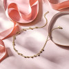 dubbele-gouden-ketting-met-bolletjes-43-cm