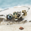 trollbeads-taube-00118-gouden-stopper-met-liefdevol-hartje