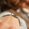 trollbeads-zilveren-bedelarmband-met-knoop-bedel-en-sluiting