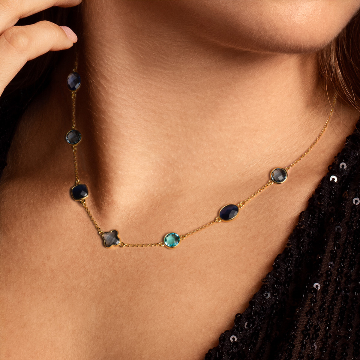 GLOW 102.8620.55 gold plated jasseron schakelketting met blauwe zirkonia's 9 mm - Lengte 55 cm