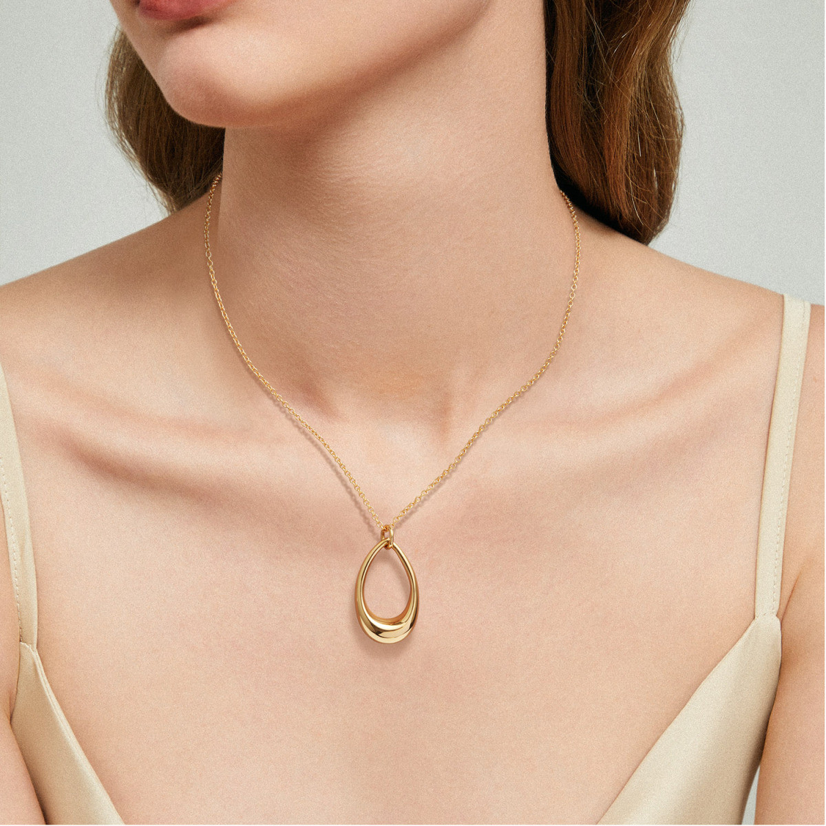 GLOW 102.8681.45 gold plated ketting met open druppel hanger - Lengte 45 cm