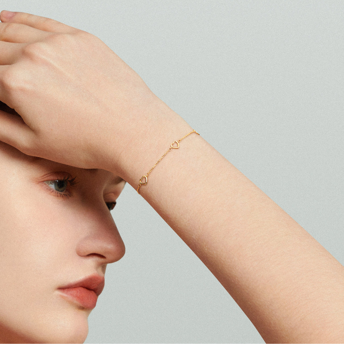 GLOW 204.0236.19 gouden schakelarmband met opengewerkte hartjes 6 mm - Lengte 19 cm