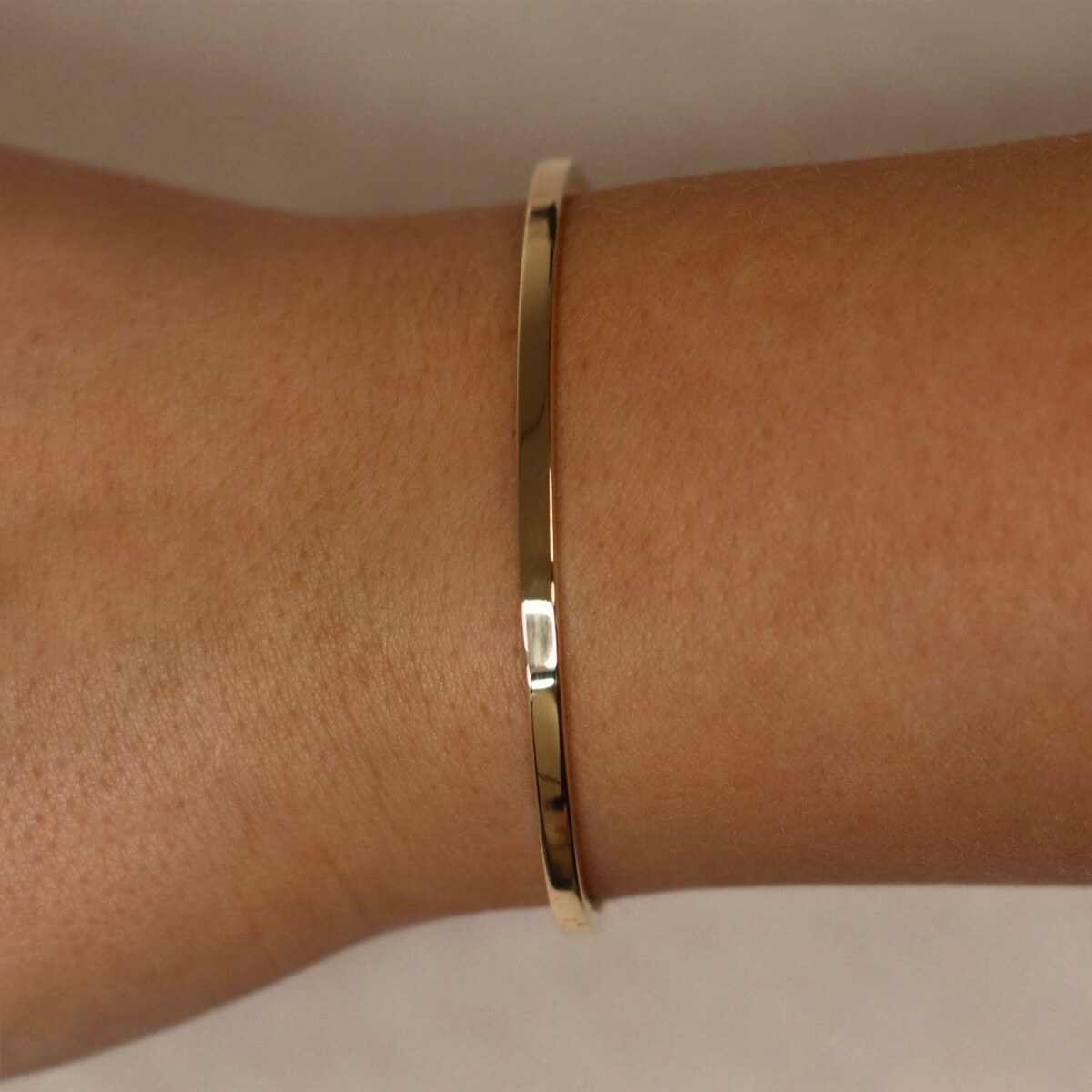 GLOW 204.2565.60 massieve gouden bangle met zilveren kern 5 mm breed - Diameter 60 mm