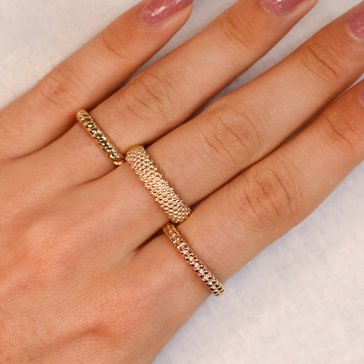 GLOW 214.1222 14-karaat gouden gedraaide ring 3 mm breed