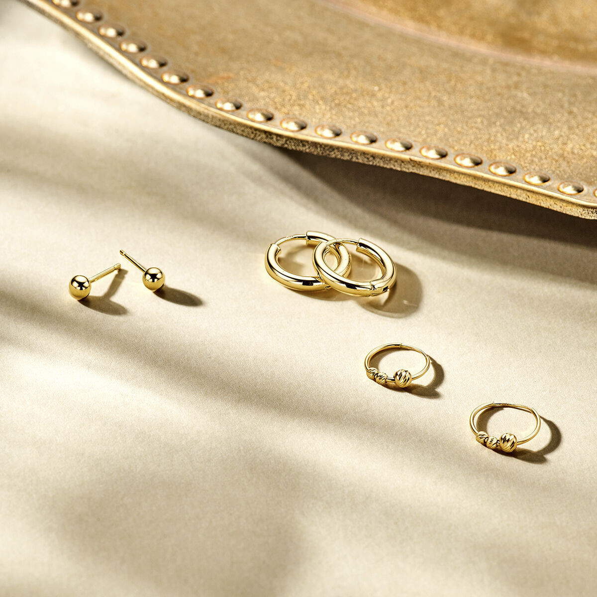 Gouden klapcreolen 2.5 mm ronde buis
