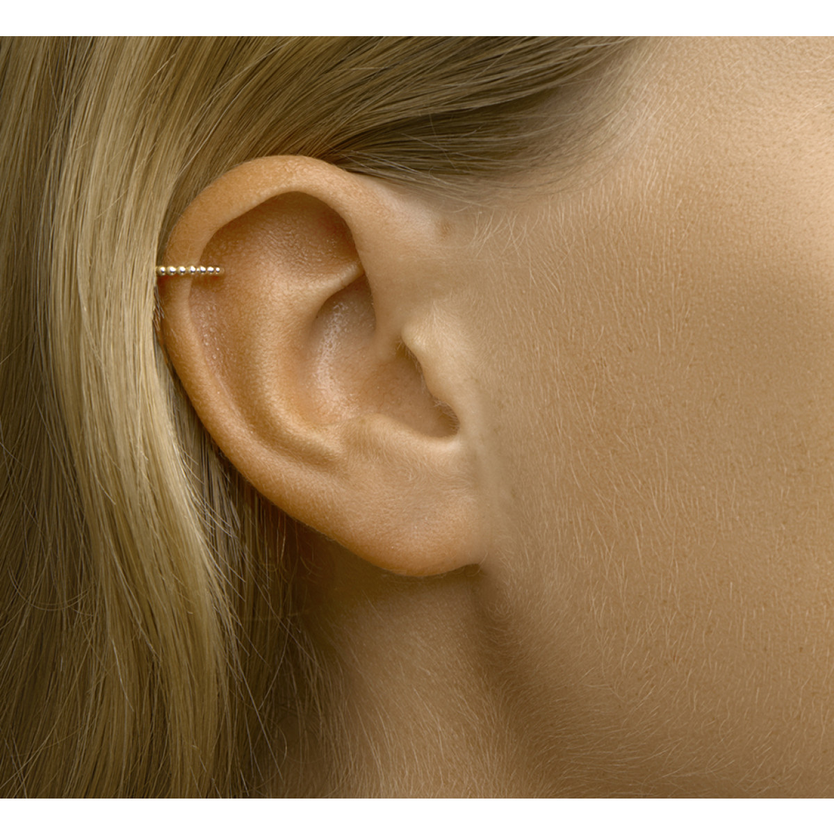 Gouden earcuff bolletjes