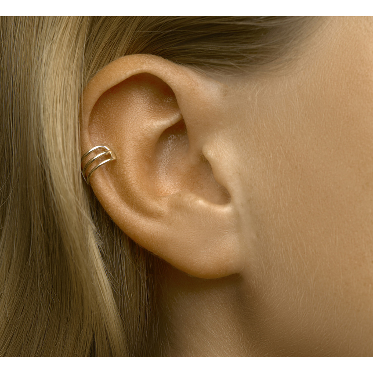 Gouden earcuff drie ringetjes