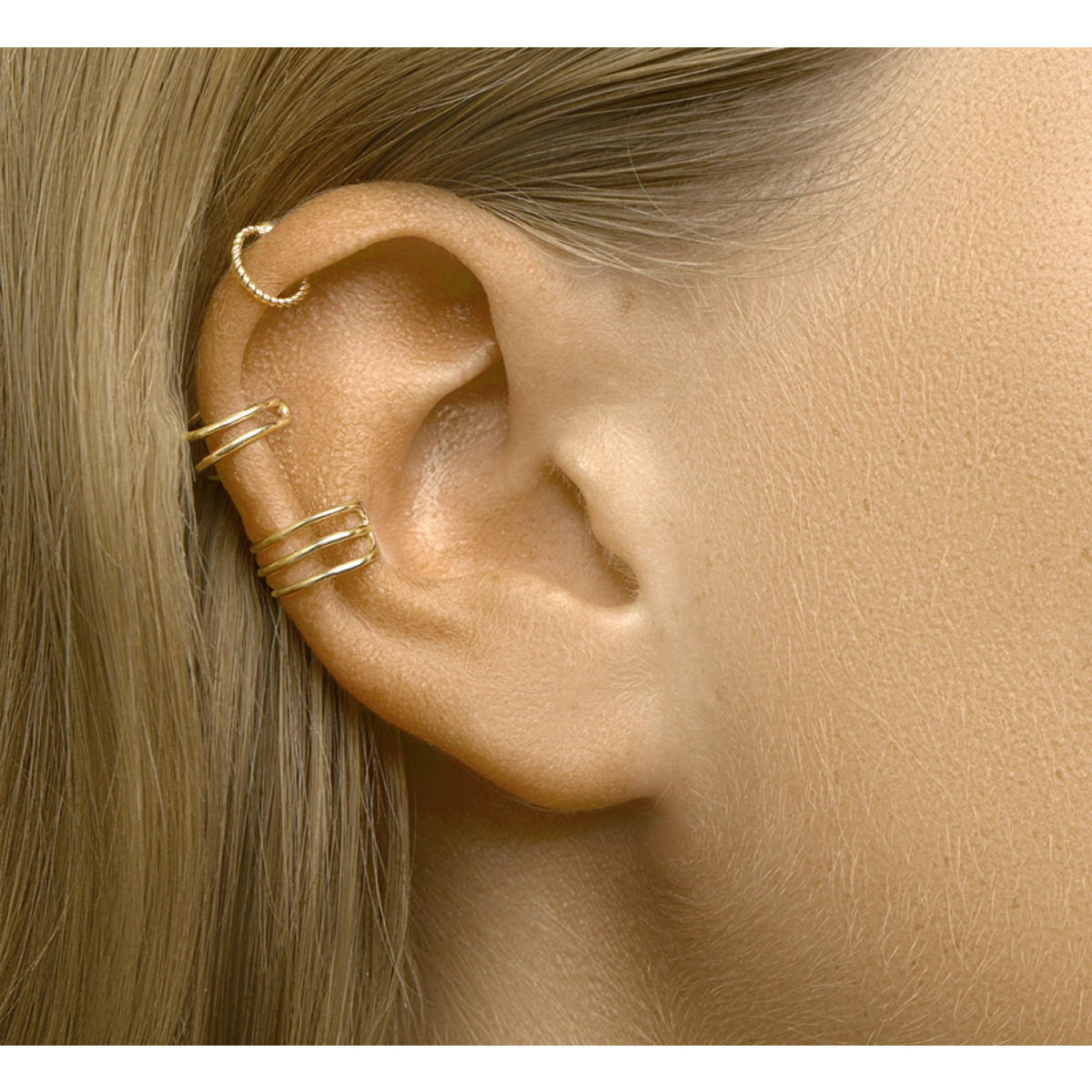 Gouden earcuff drie ringetjes