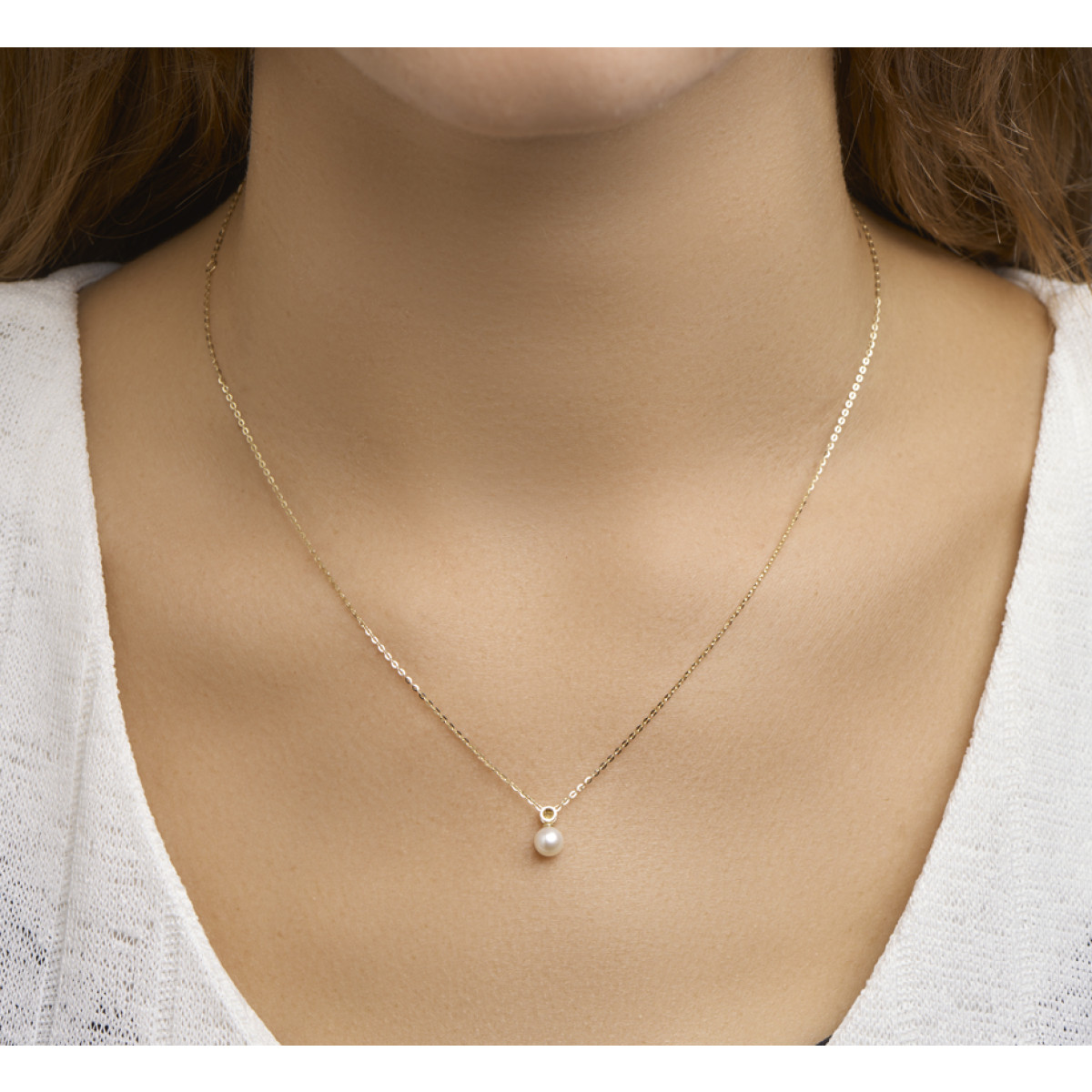 Gouden ketting parel