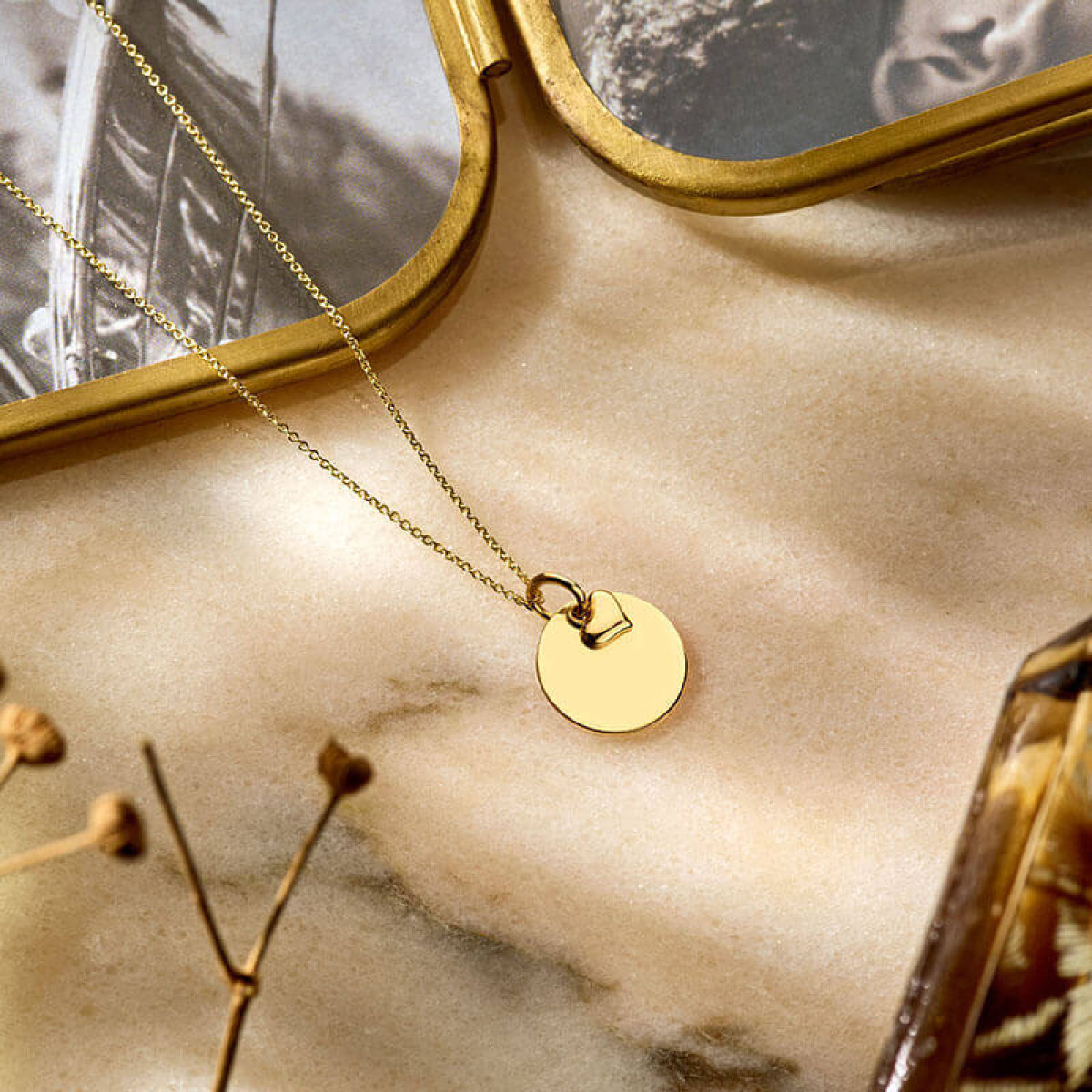 Gouden hanger rondje en hartje