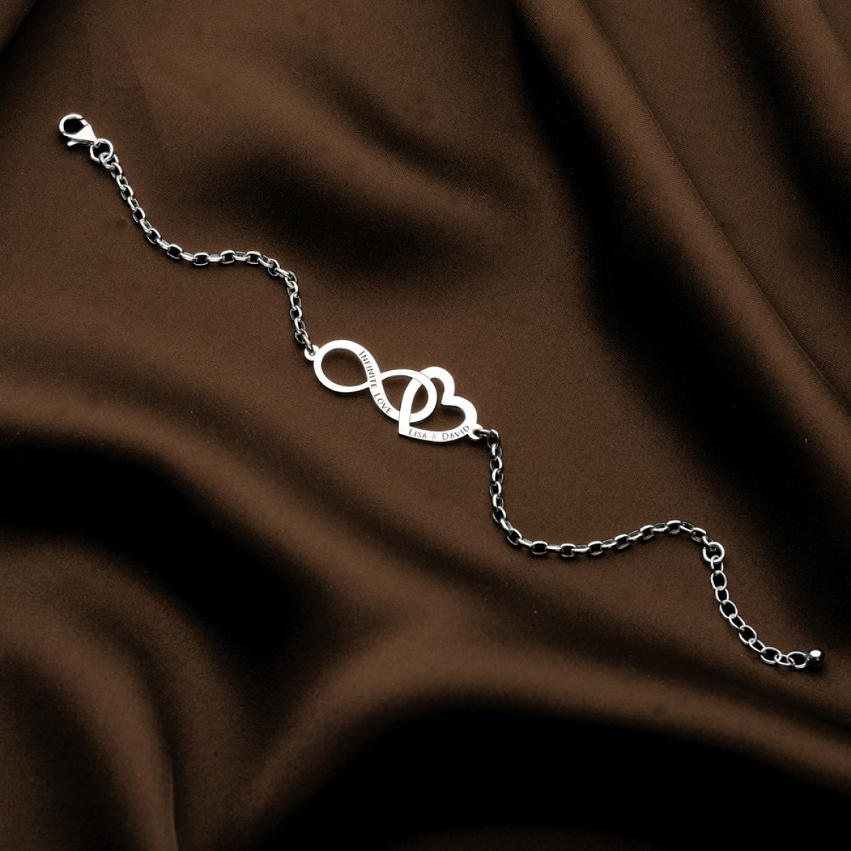 Names4ever zilveren armband met open hartje en infinity met eigen tekst 