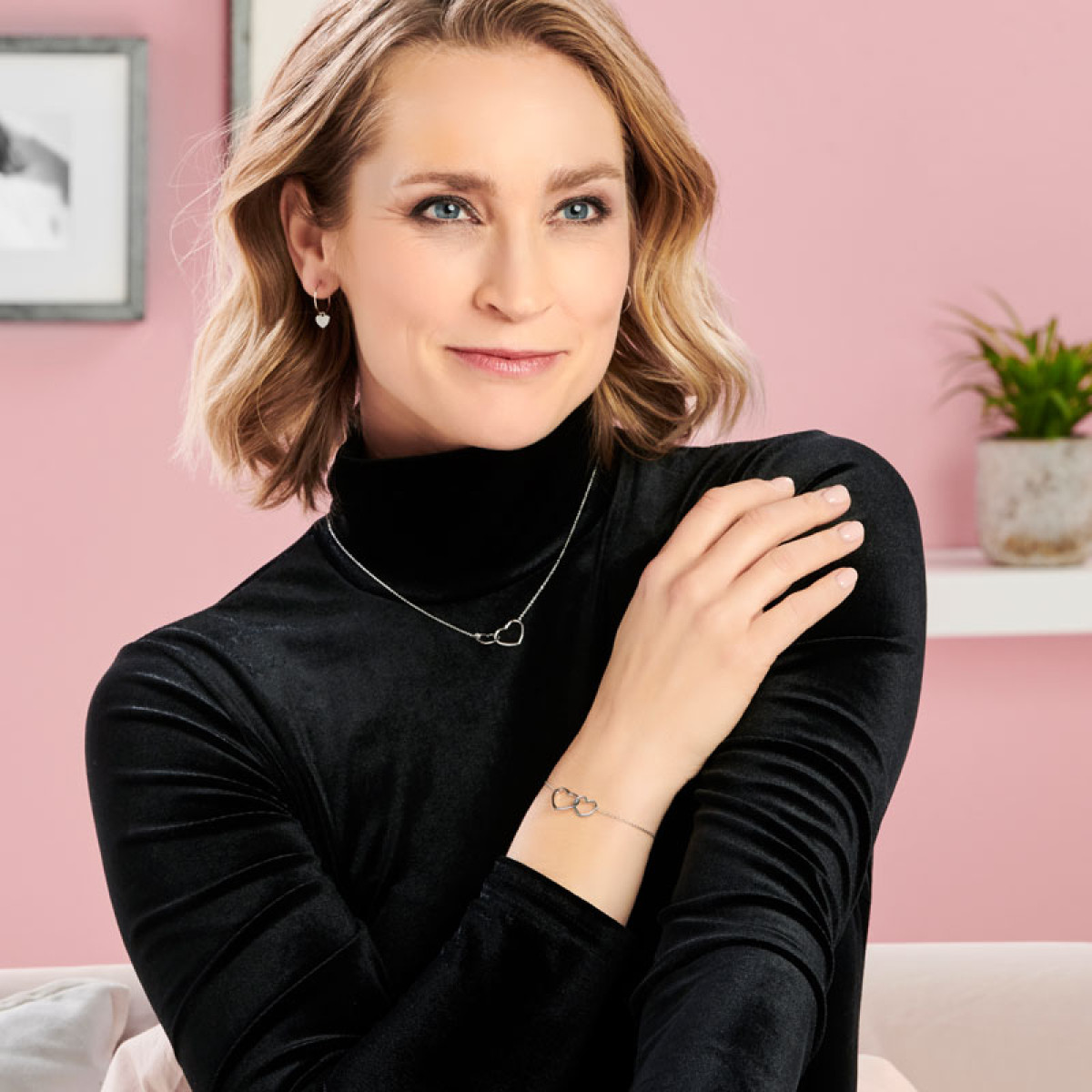 Zilver collier met twee verbonden harten