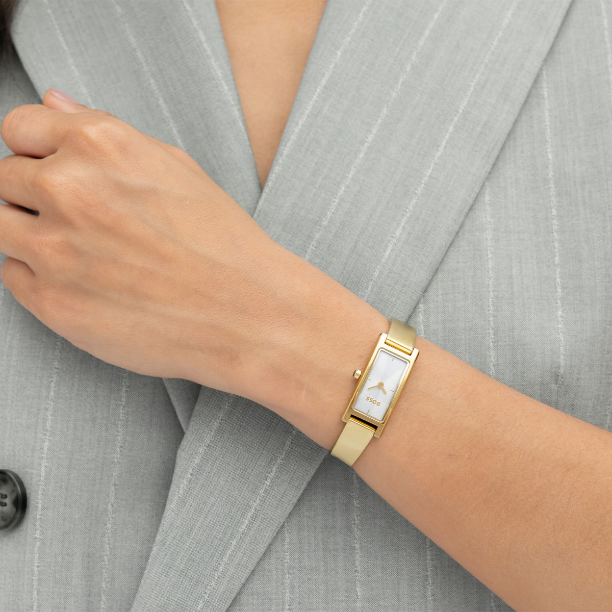 Boss Lucy Allure HB1502857 goudkleurig dameshorloge met rechthoekige zilverkleurige wijzerplaat - Ø 33 mm