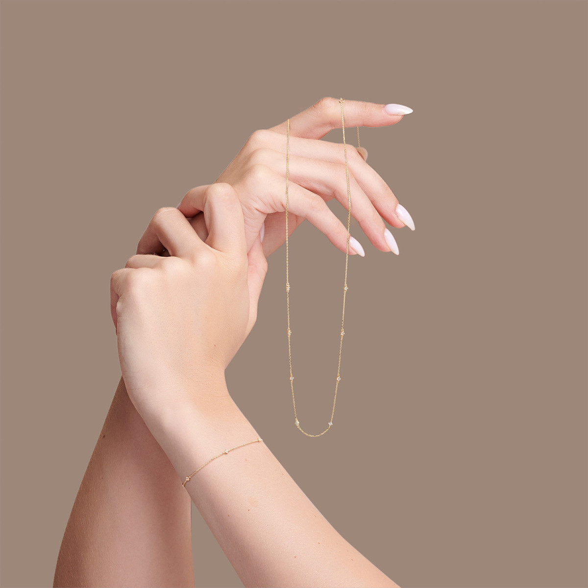 Jackie Gold Celebration JKB25.585 Armband van14-karaat geelgoud met transparante topaas - Lengte 16-17-18 cm