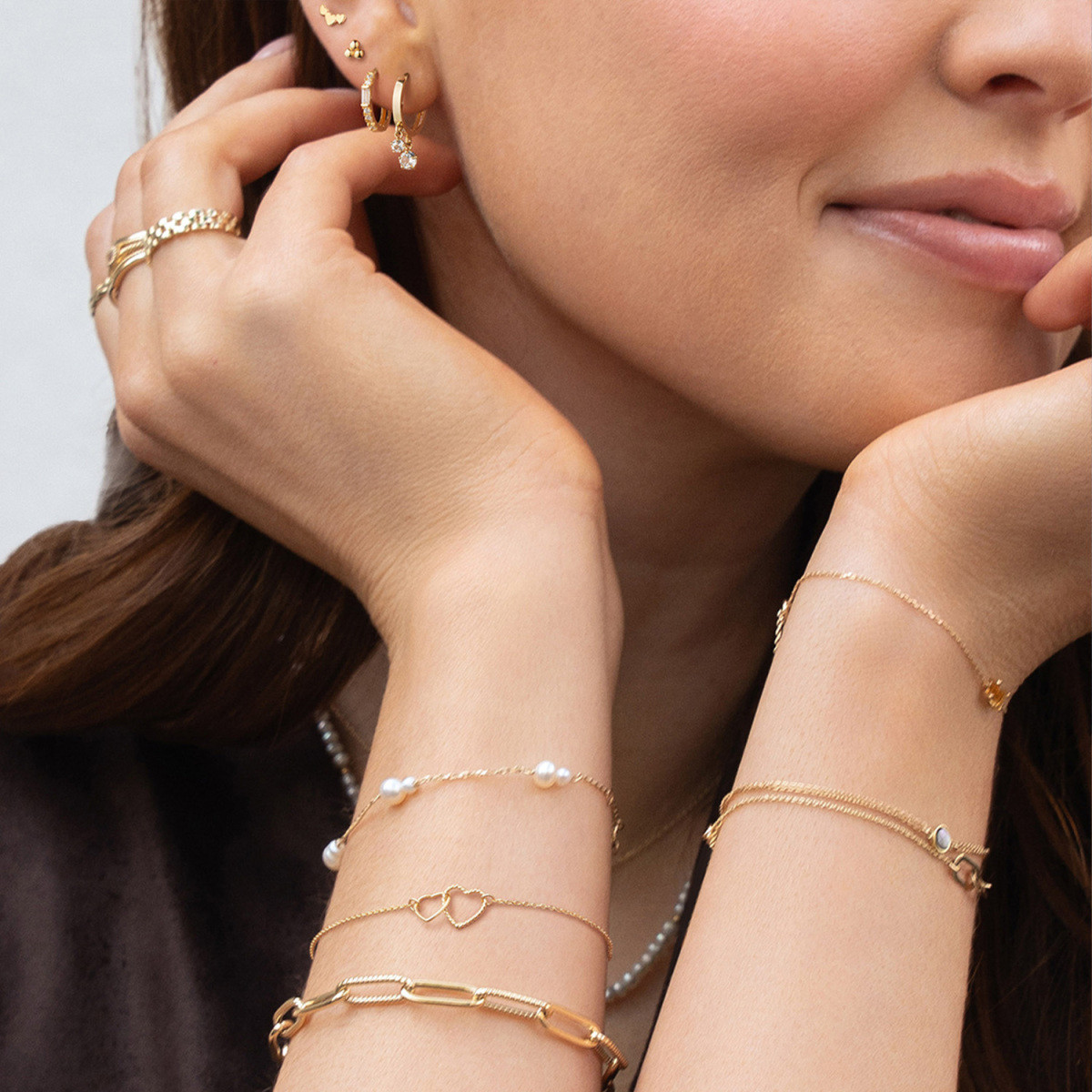 Jackie Gold Connected Love JKB25.559 Armband van 14-karaat geelgoud met open hartjes - Lengte 16-17-18 cm