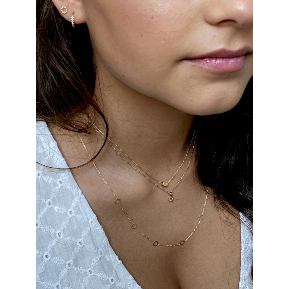 Jackie Gold JKN20.082 14-karaat gouden ketting met 7 open rondjes 5 mm breed - Lengte 54-57-60 cm