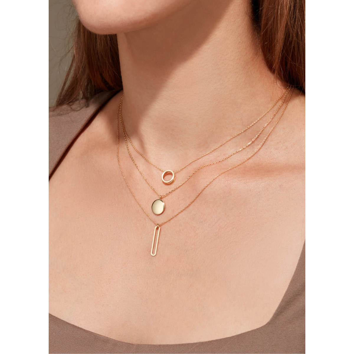 Jackie Gold JKN24.467 14-karaat gouden schakelketting met ronde hanger - Lengte 40-42.5-45 cm