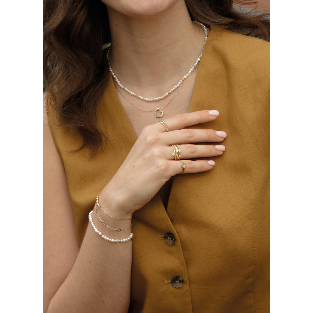 Jackie Gold JKR24.418 14-karaat gouden bolletjes ring met transparante topaas