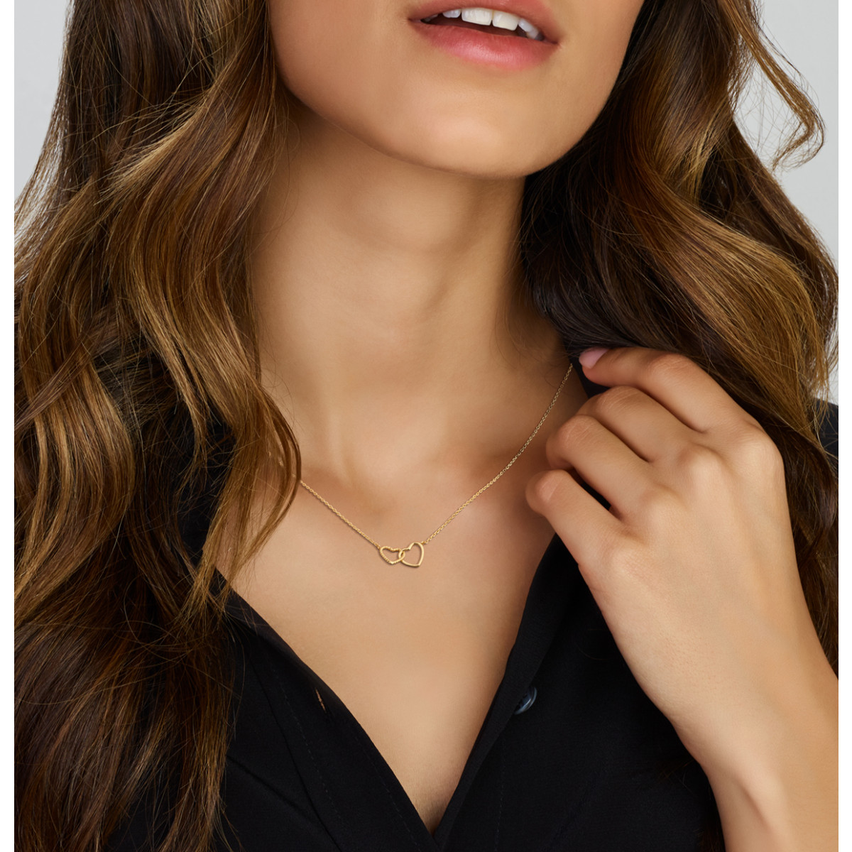 14-karaat gouden ketting met gedraaid en glanzend hartje - Lengte 40-42-44 cm