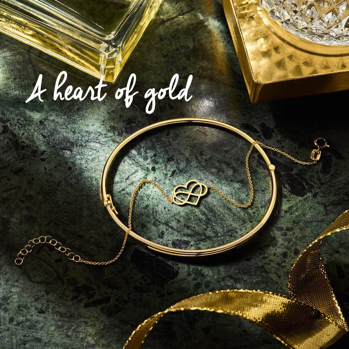 14-karaat gouden schakelarmband met hart- en infinityvorm 1 mm breed - Lengte 16-19 cm