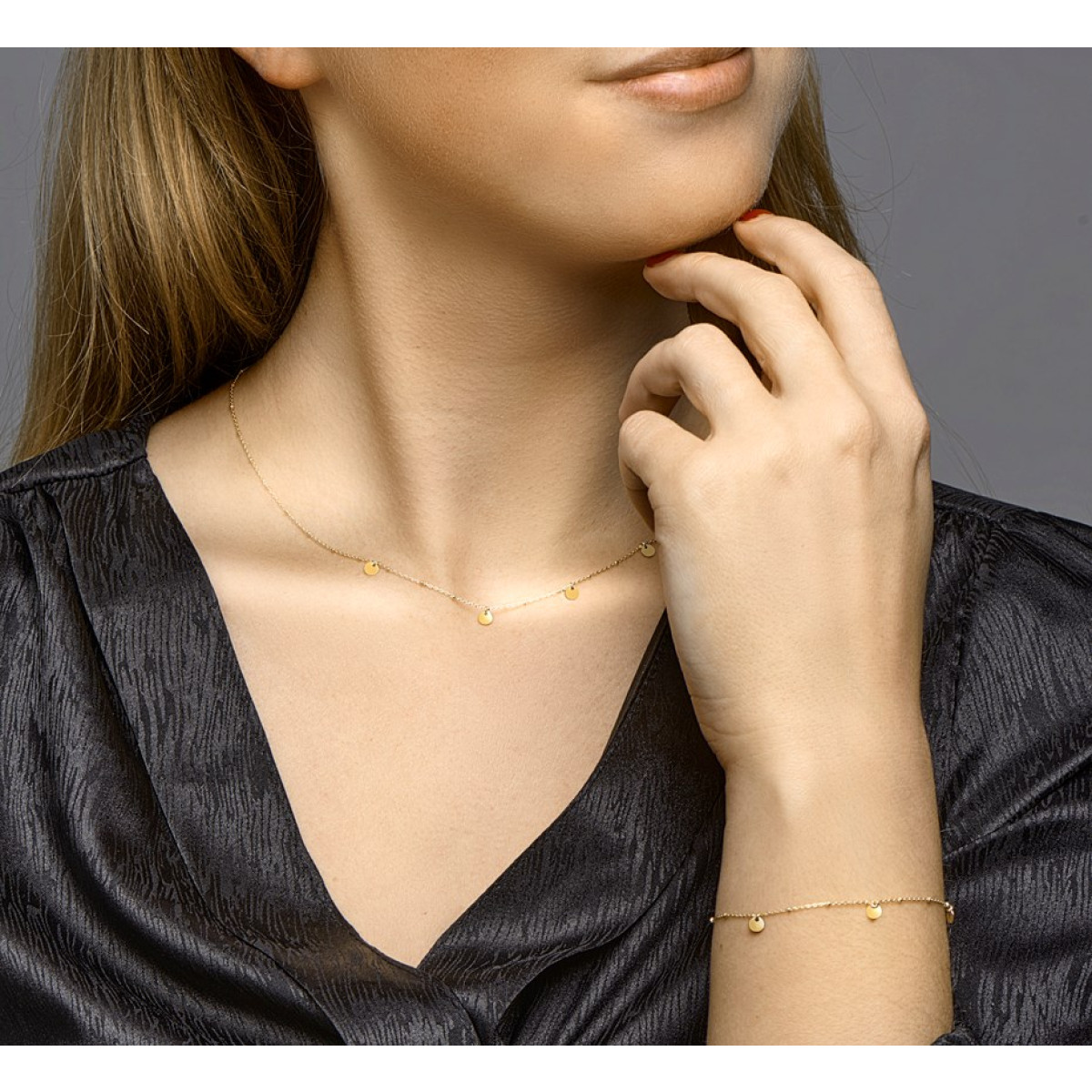 Armband goud met vier rondjes
