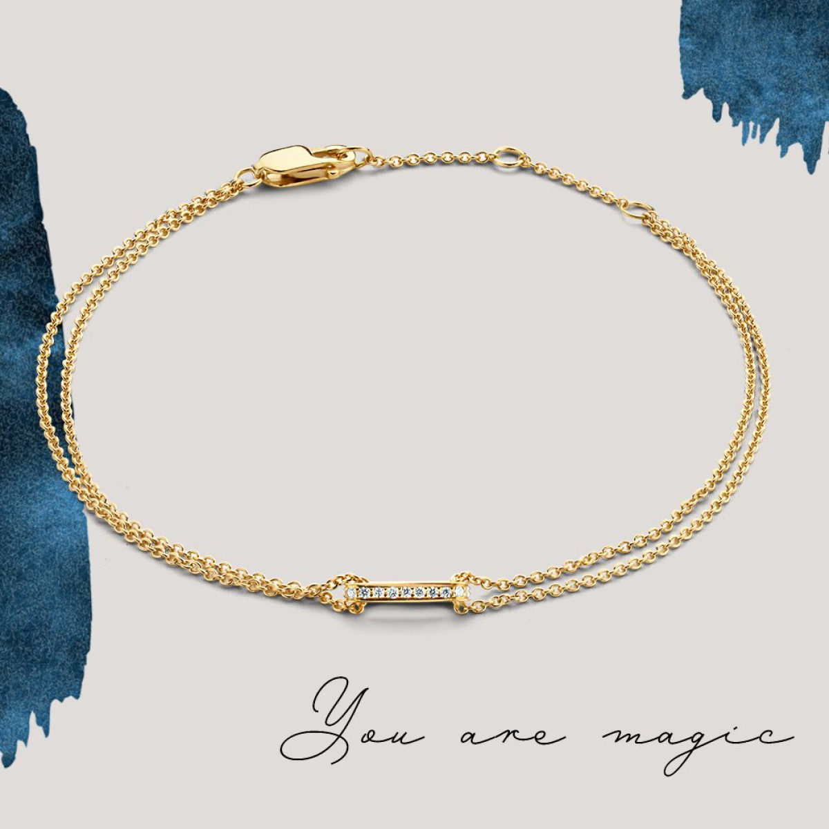 Dubbele gouden armband met diamantrij
