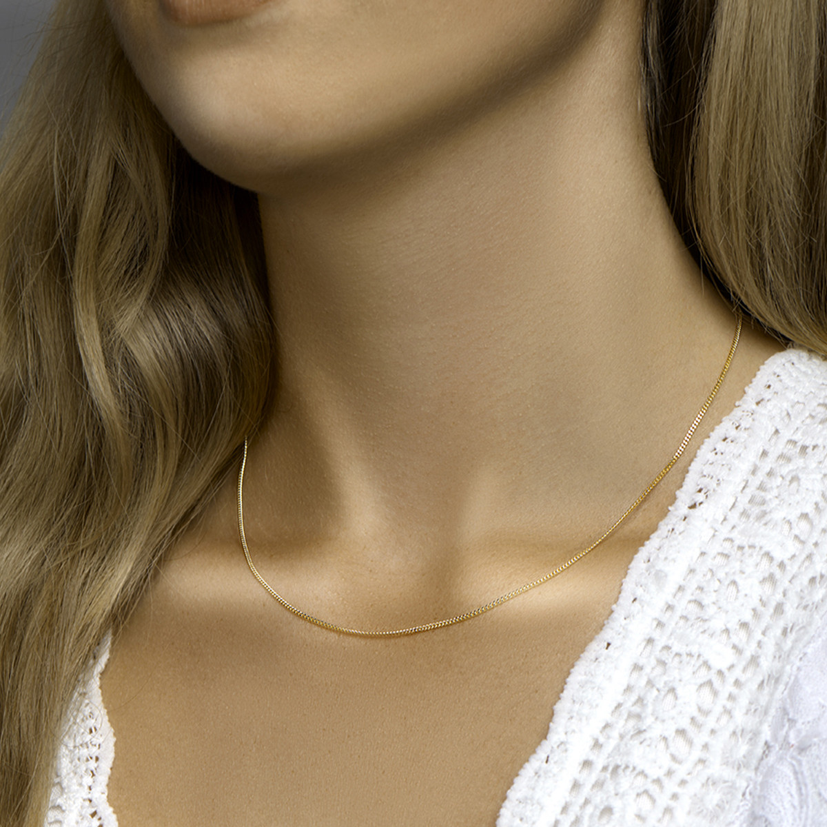 Gold plated ketting met gourmet schakels glanzend afgewerkt 1.4 mm breed - Lengte 41-45 cm