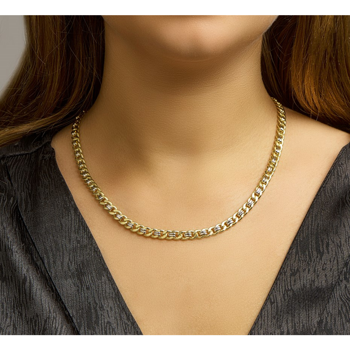 Gouden gourmet ketting met zilveren kern 6 mm