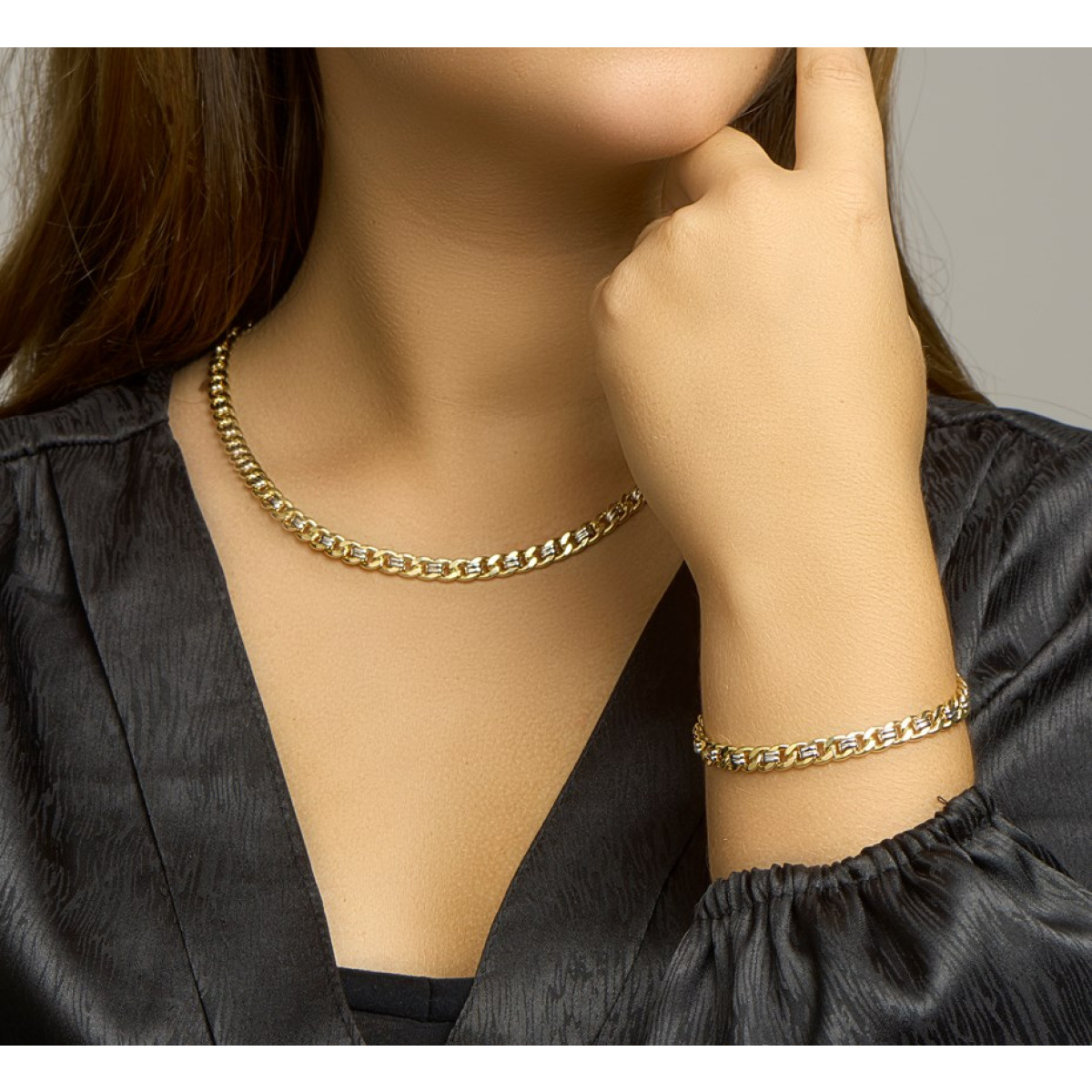 Gouden gourmet ketting met zilveren kern 6 mm
