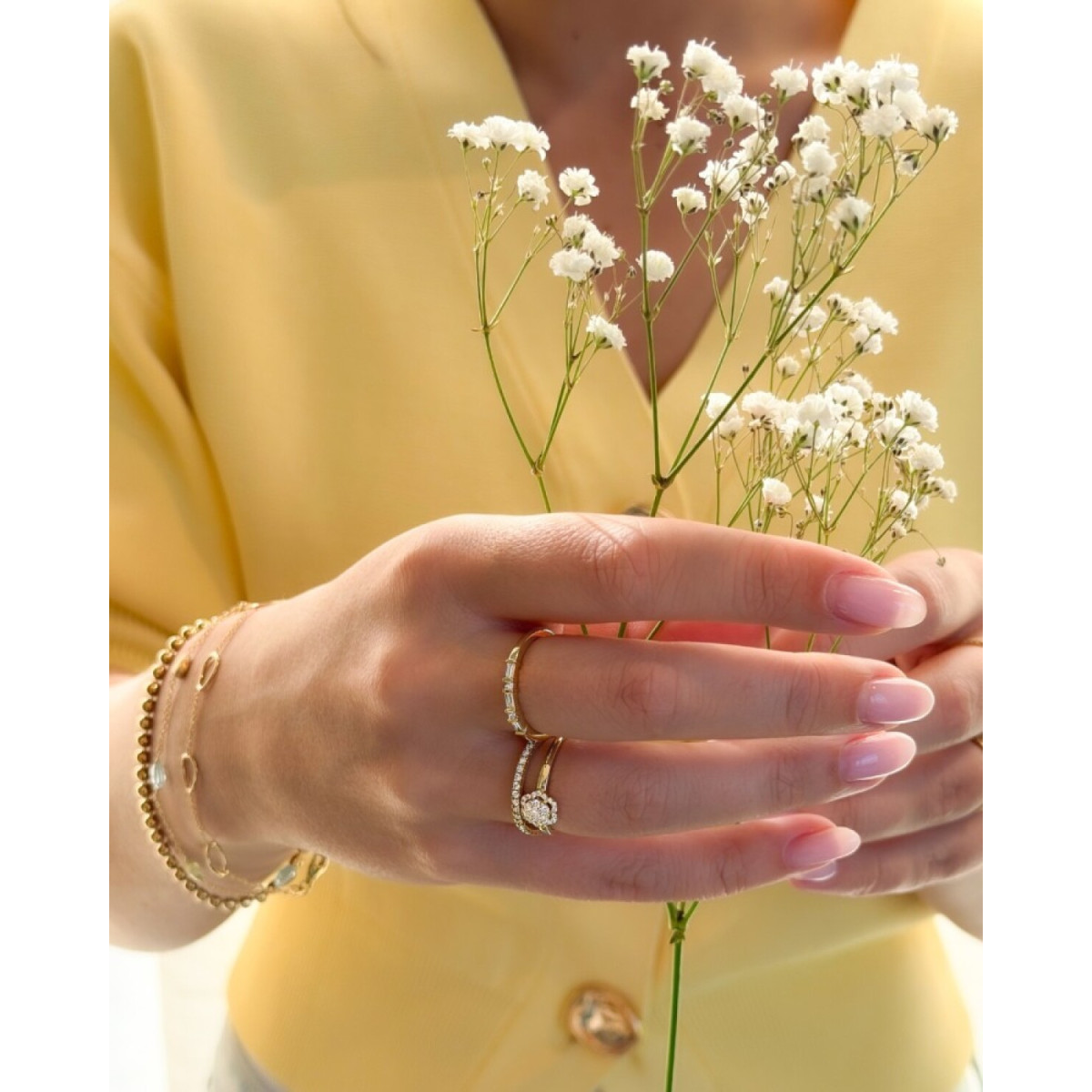 Gouden halo ring bloem met 0.22 crt diamanten 7.5 mm breed