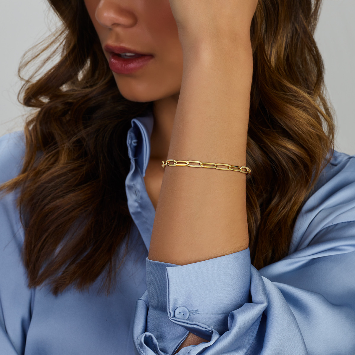 Gouden paperclip armband platte buis 5 mm - Lengte 18.5 cm
