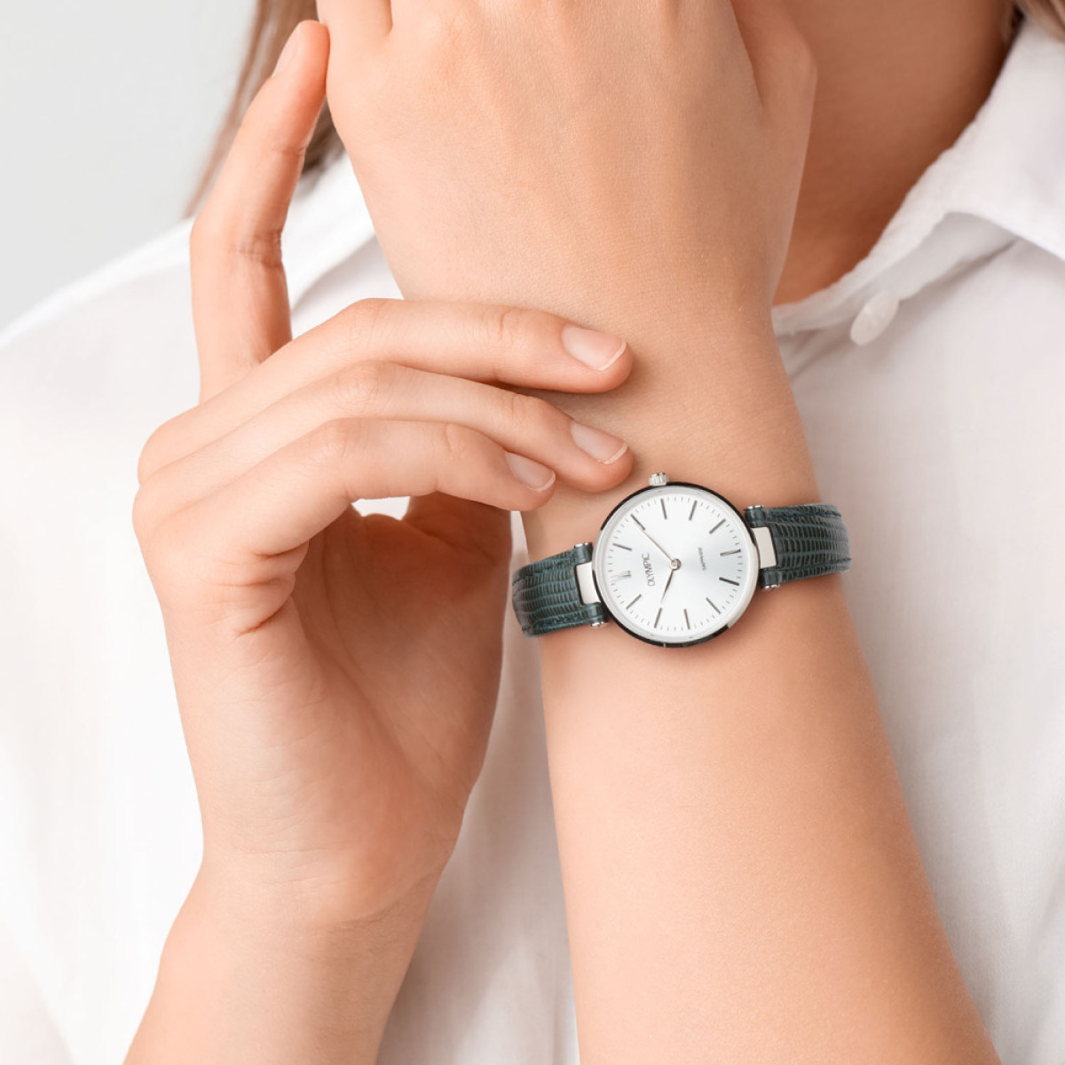 Olympic Titanium OL80DTL001 Dameshorloge met zilverkleurige wijzerplaat en groene leren band
