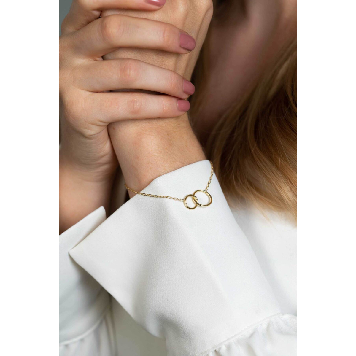 Zinzi ZIA2275G goudkleurige armband met 2 verbonden cirkels 12.5 mm breed - Lengte 17-20 cm