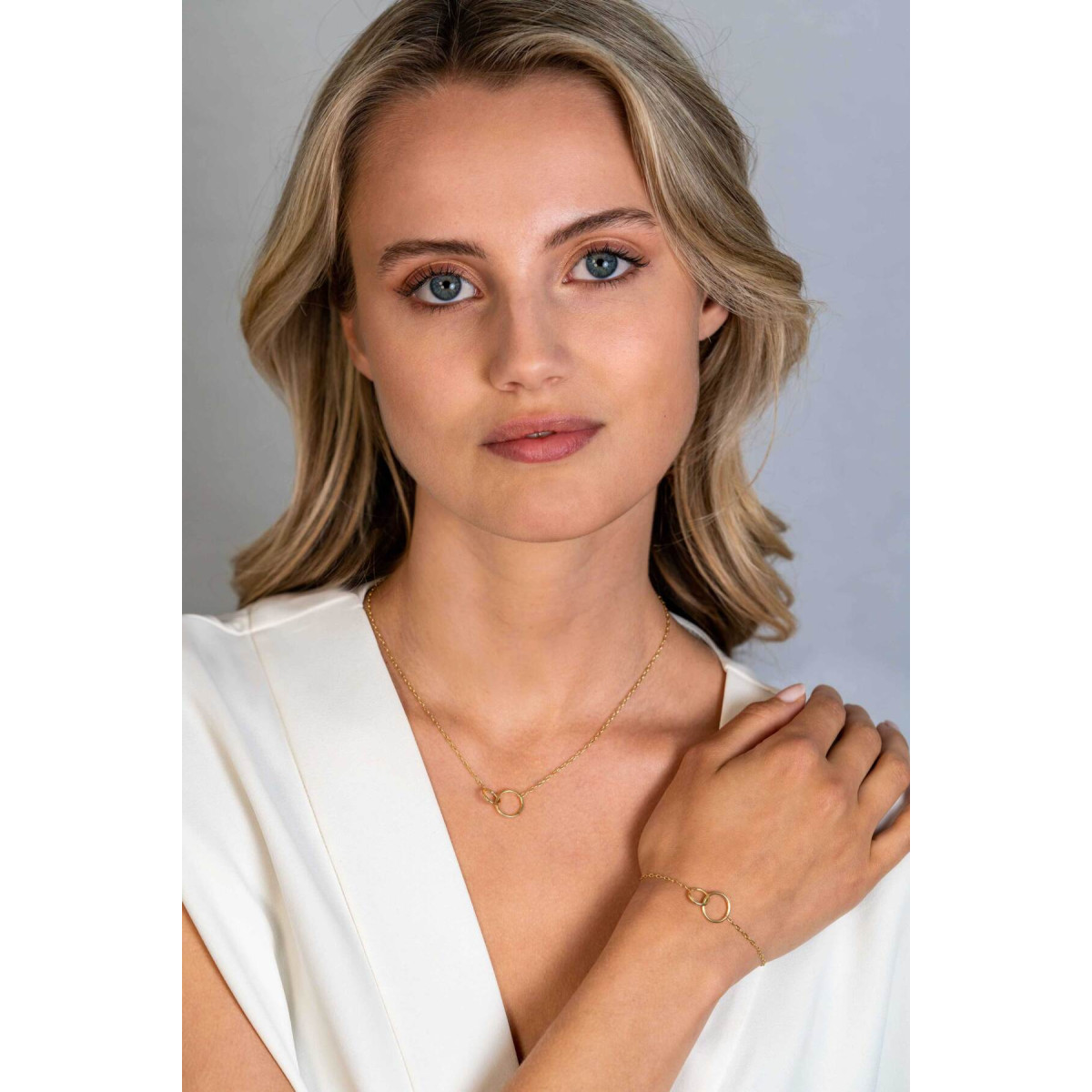 Zinzi ZIA2275G goudkleurige armband met 2 verbonden cirkels 12.5 mm breed - Lengte 17-20 cm