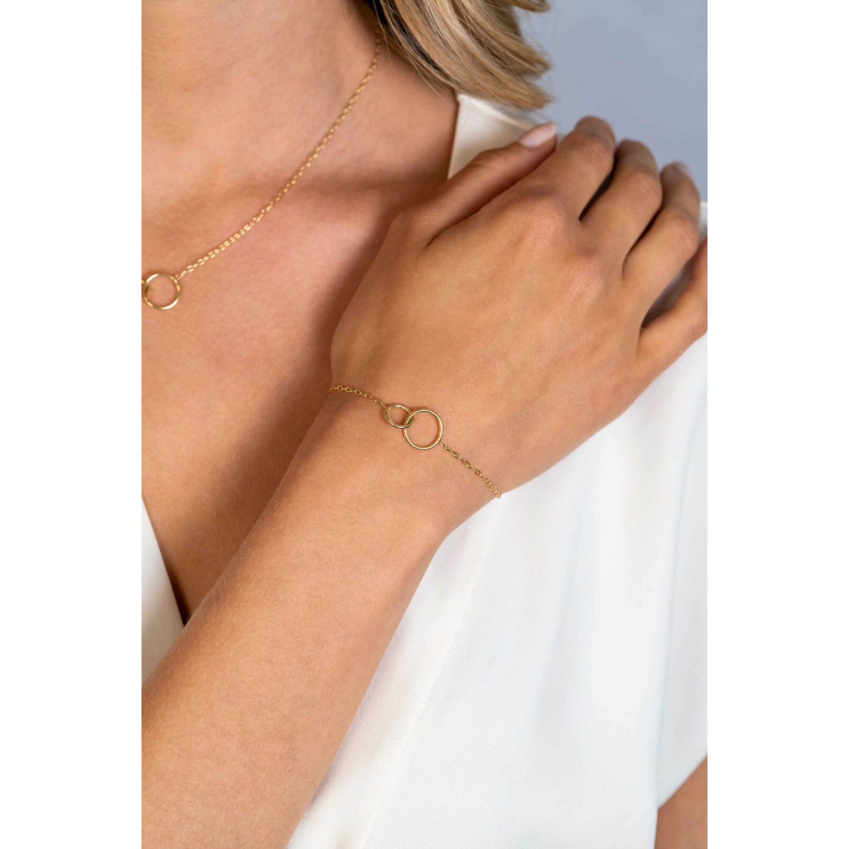Zinzi ZIA2275G goudkleurige armband met 2 verbonden cirkels 12.5 mm breed - Lengte 17-20 cm