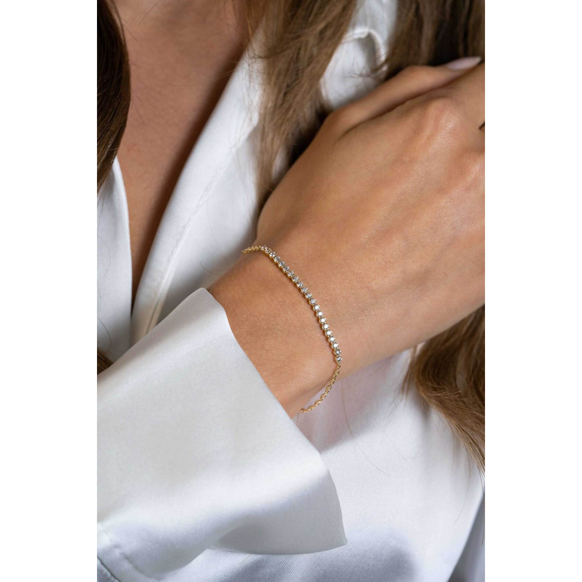 Zinzi ZIA2370Y goudkleurige armband met zirkonia rij 2.5 mm breed - Lengte 16-19 cm