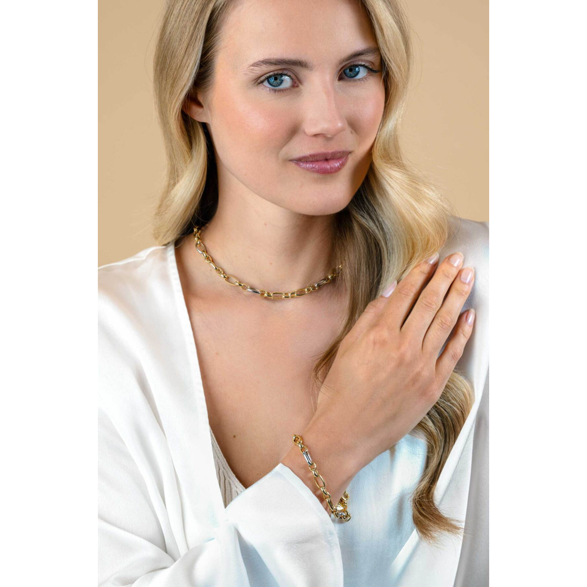 Zinzi ZIA2639 gold plated schakelarmband met 3 zilveren ovale schakels 7.5 mm breed - Lengte 19 cm