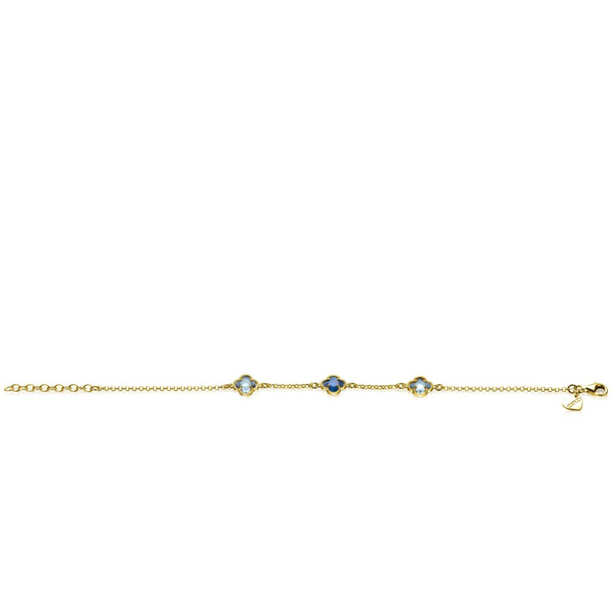 Zinzi ZIA2662B gold plated armband met blauwe klavertjes vier 9 mm breed - Lengte 17-20 cm