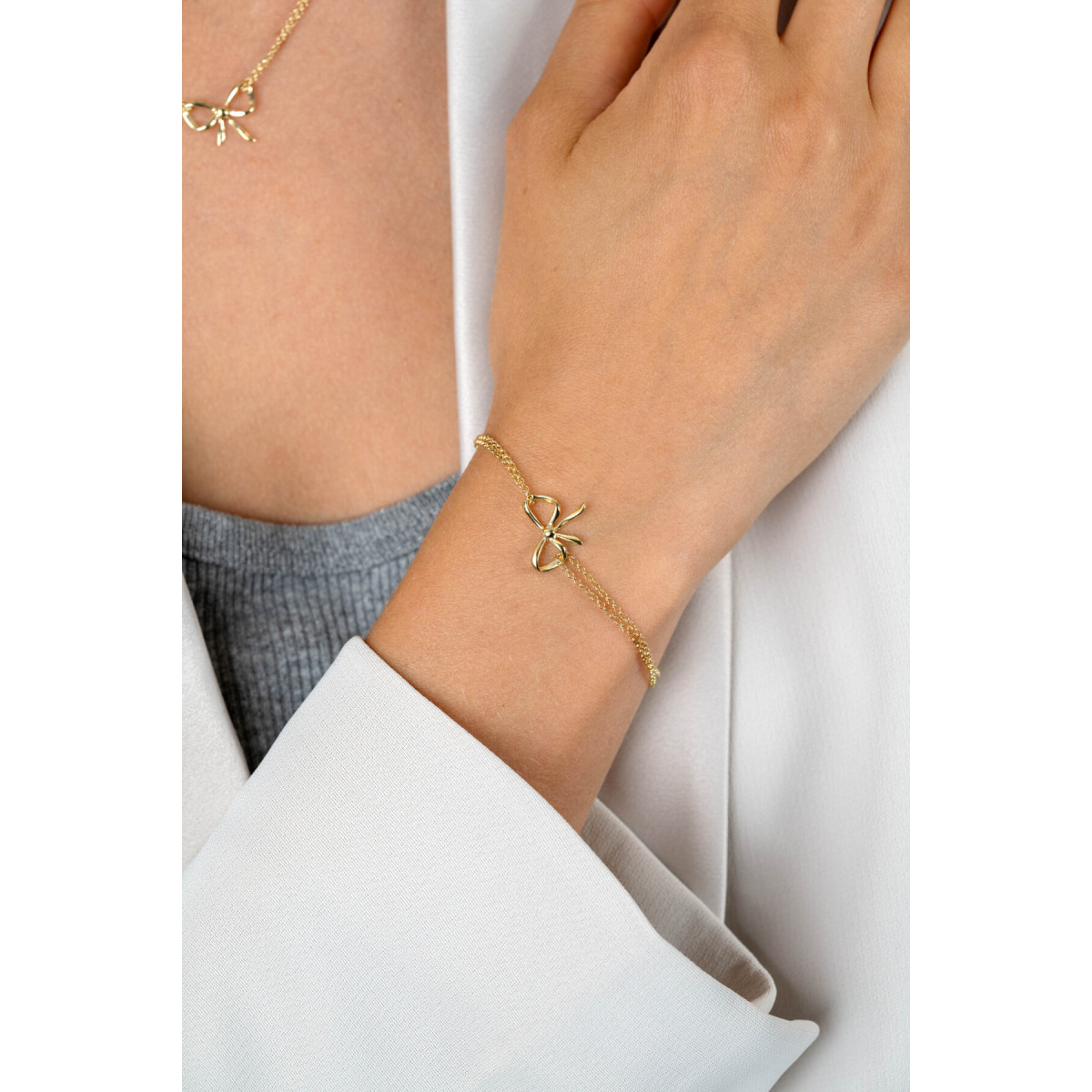 Zinzi ZIA2677 goudkleurige armband met strik en dubbele band 12.5 mm breed - Lengte 17-20 cm