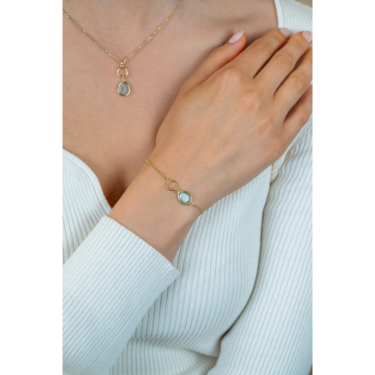 Zinzi ZIA2716G gold plated armband met ovale blauwe steen 9.8 mm breed - Lengte 16-19 cm