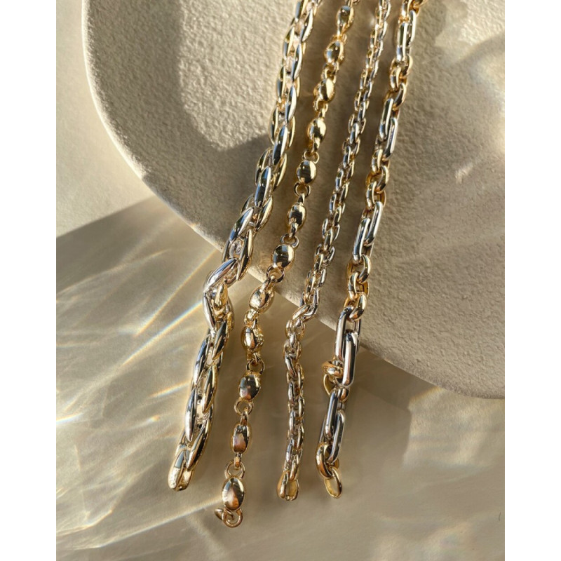 stoere-bicolor-schakelarmband-van-14-karaat-goud-en-witgoud-7-mm-breed-lengte-19-cm